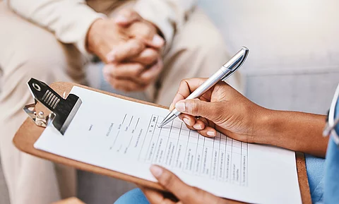 Nurse, clipboard and pen for checklist with patient, healthcare 