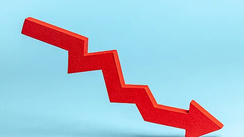 Chart with red down arrow on blue background. Falling growth in business.