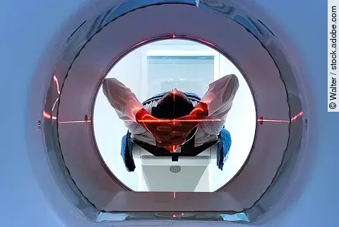 patient entering an MRI machine to produce a detailed and intern