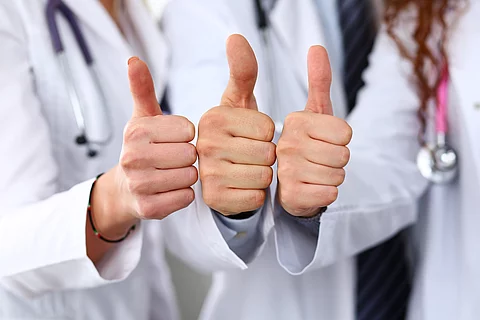 Group of doctor hands show OK or confirm sign Group of doctor hands show OK or confirm sign