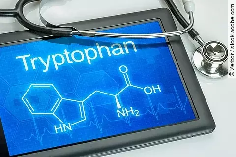 Tablet mit der chemischen Strukturformel von Tryptophan
