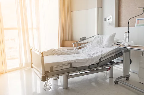 Soft focus background of electrical adjustable patient bed in ho