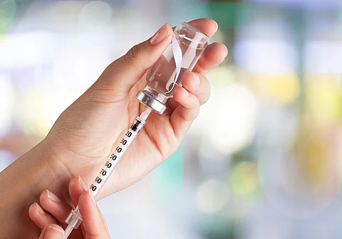 Injecting.